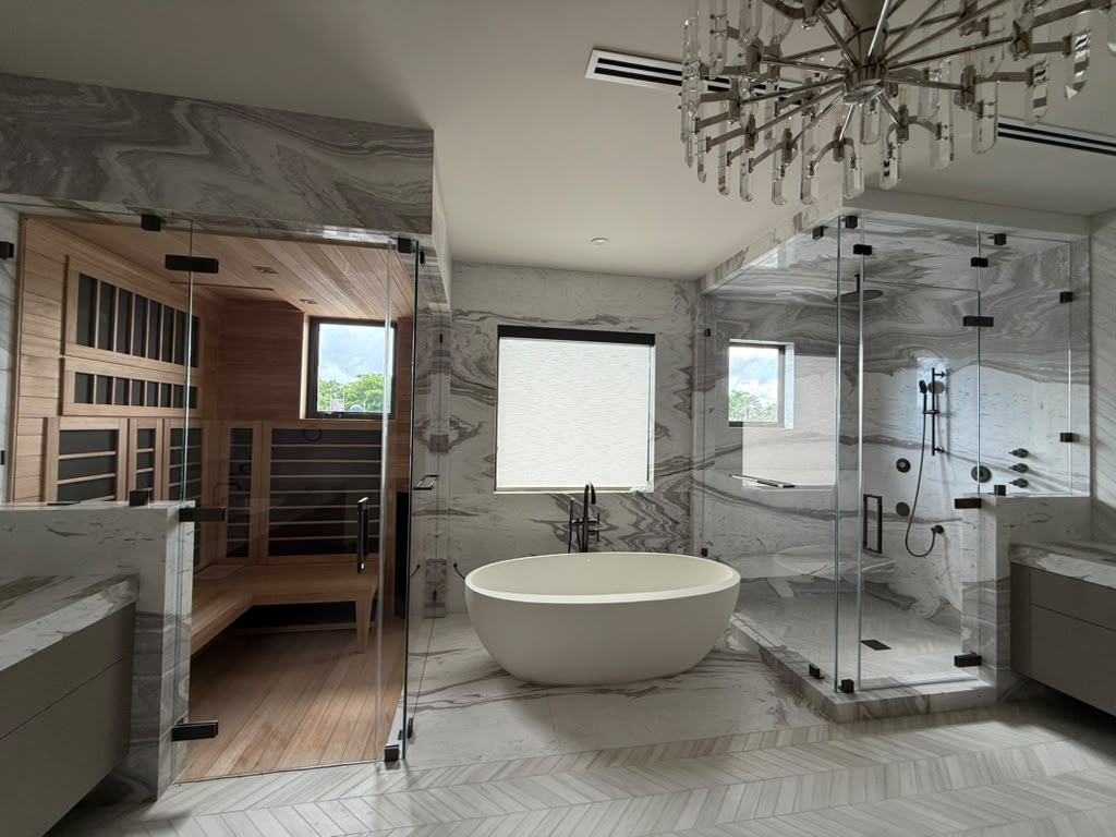 Recent custom glass installation by JCGLASS AND SHOWER DOOR LLC